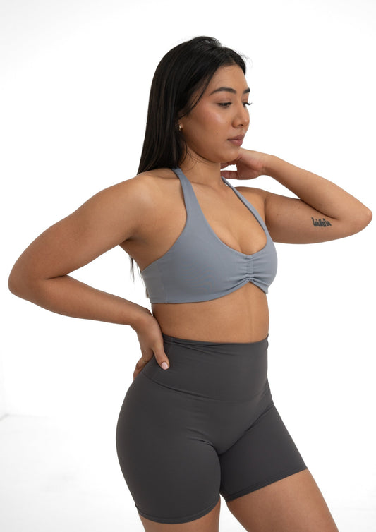 girl model wearing grey activewear set