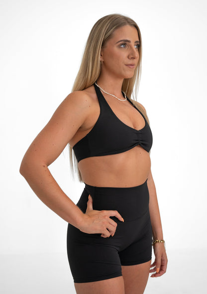 girl model wearing black activewear set